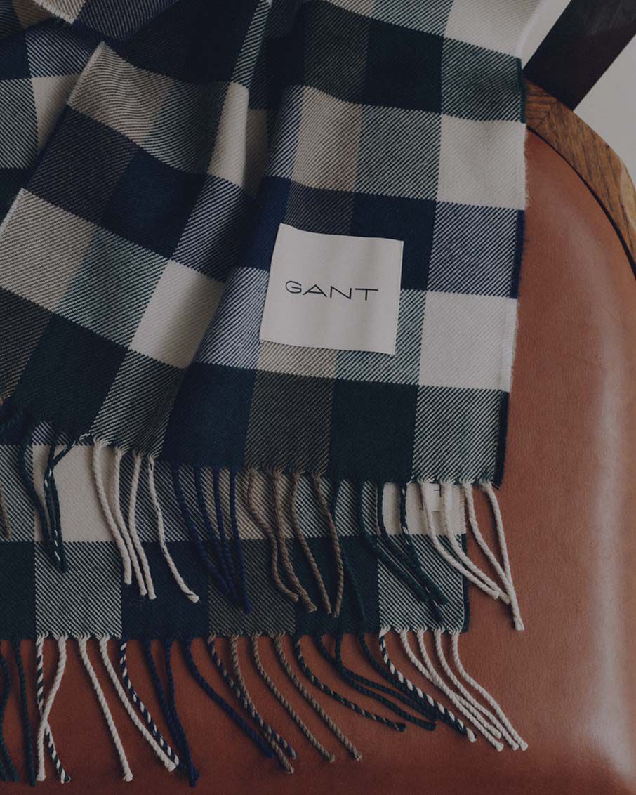 Tonal checked wool scarf on chair