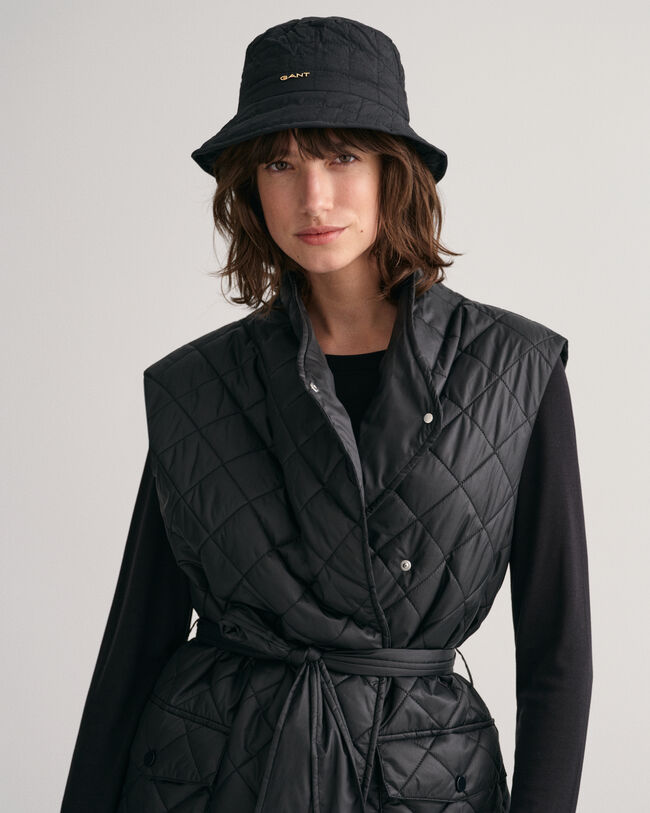 Piumino smanicato trapuntato lungo