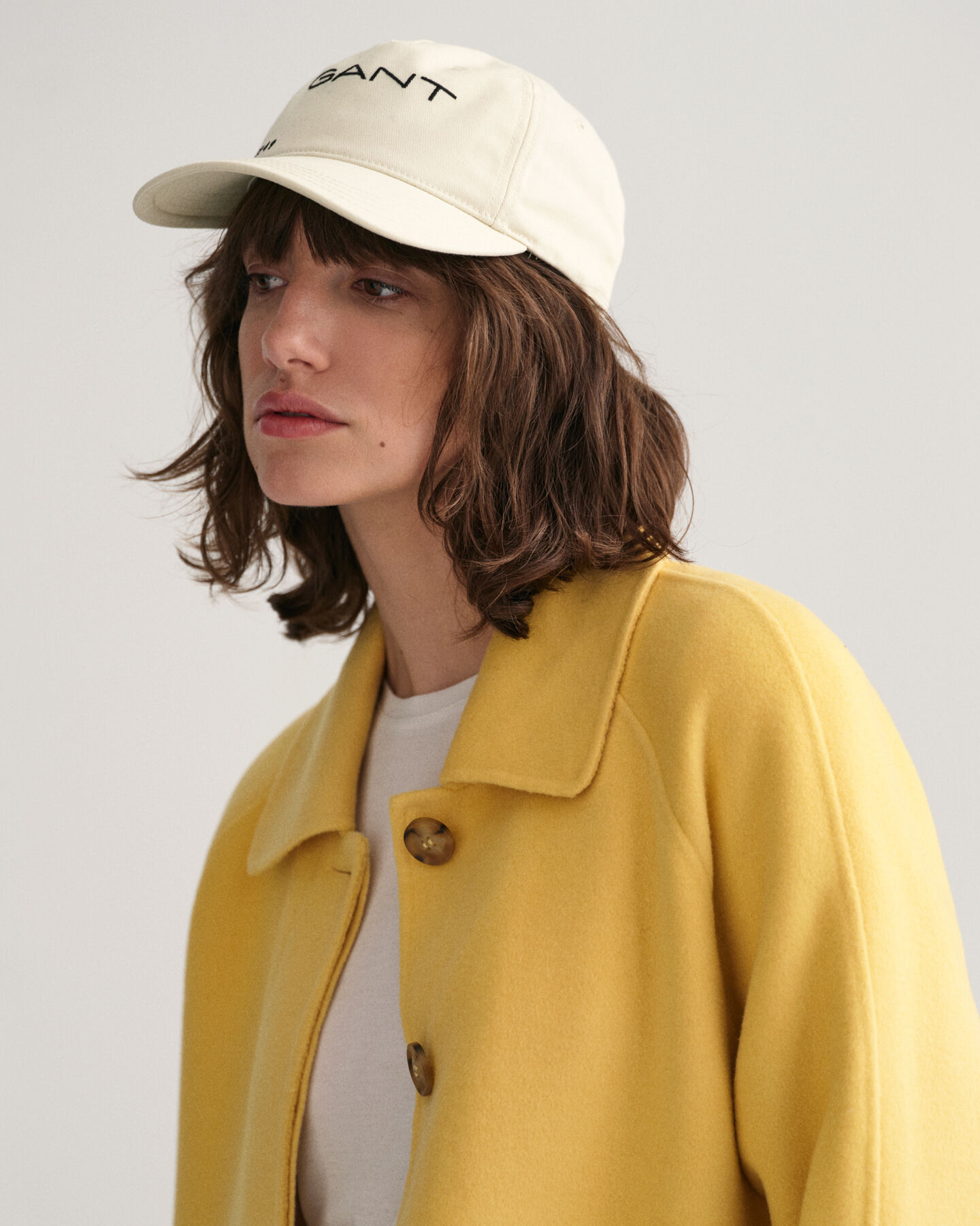 Impermeabile cucito a mano