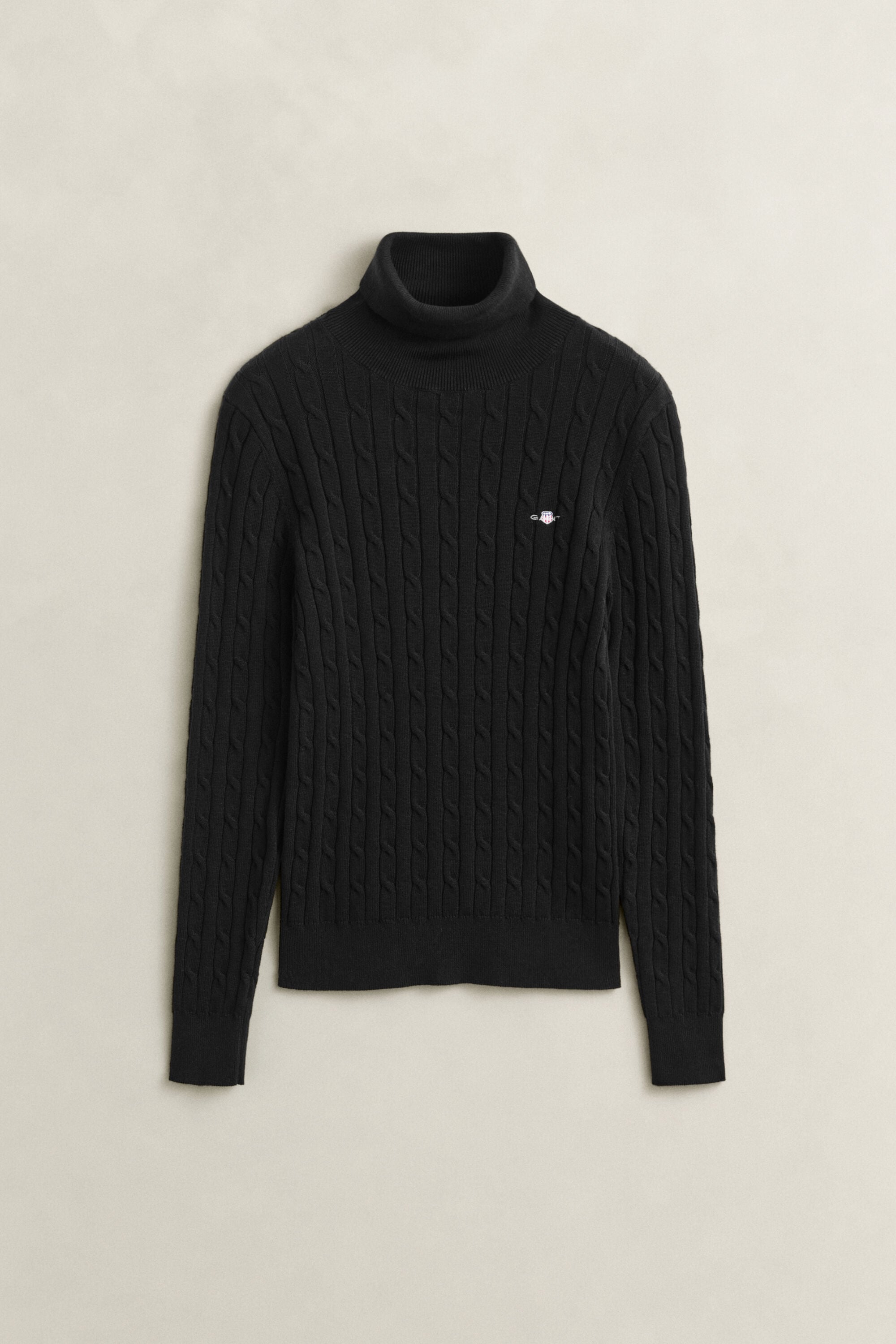 Maglia a collo alto in cotone elasticizzato a trecce