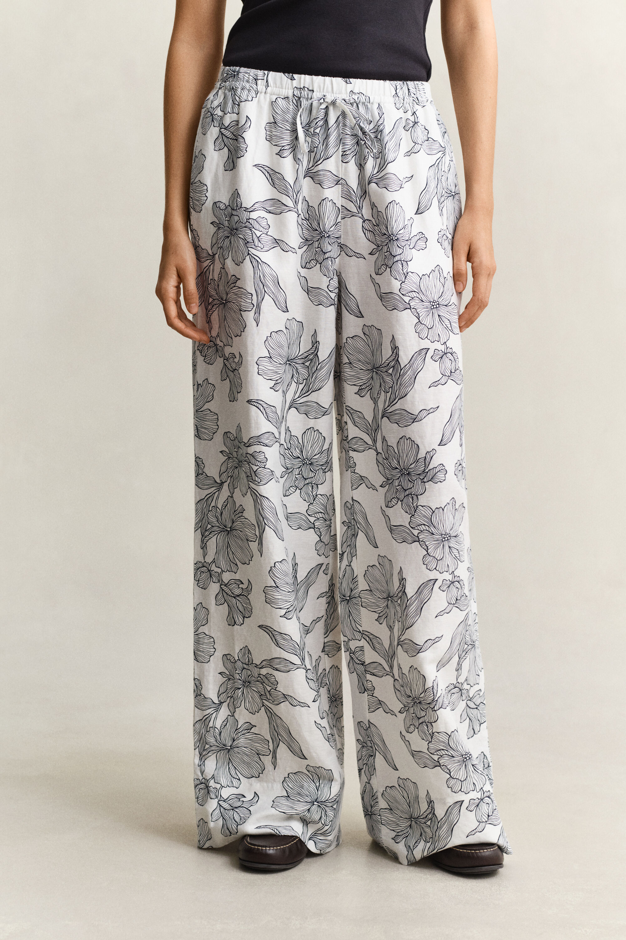 Pantaloni in lino con stampa floreale