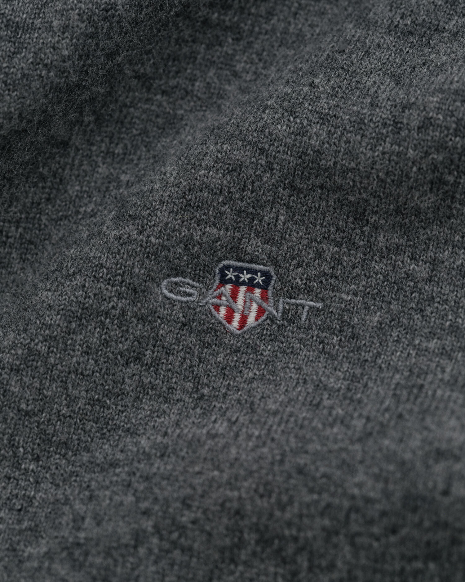 Cardigan con zip in finissima lana d’agnello