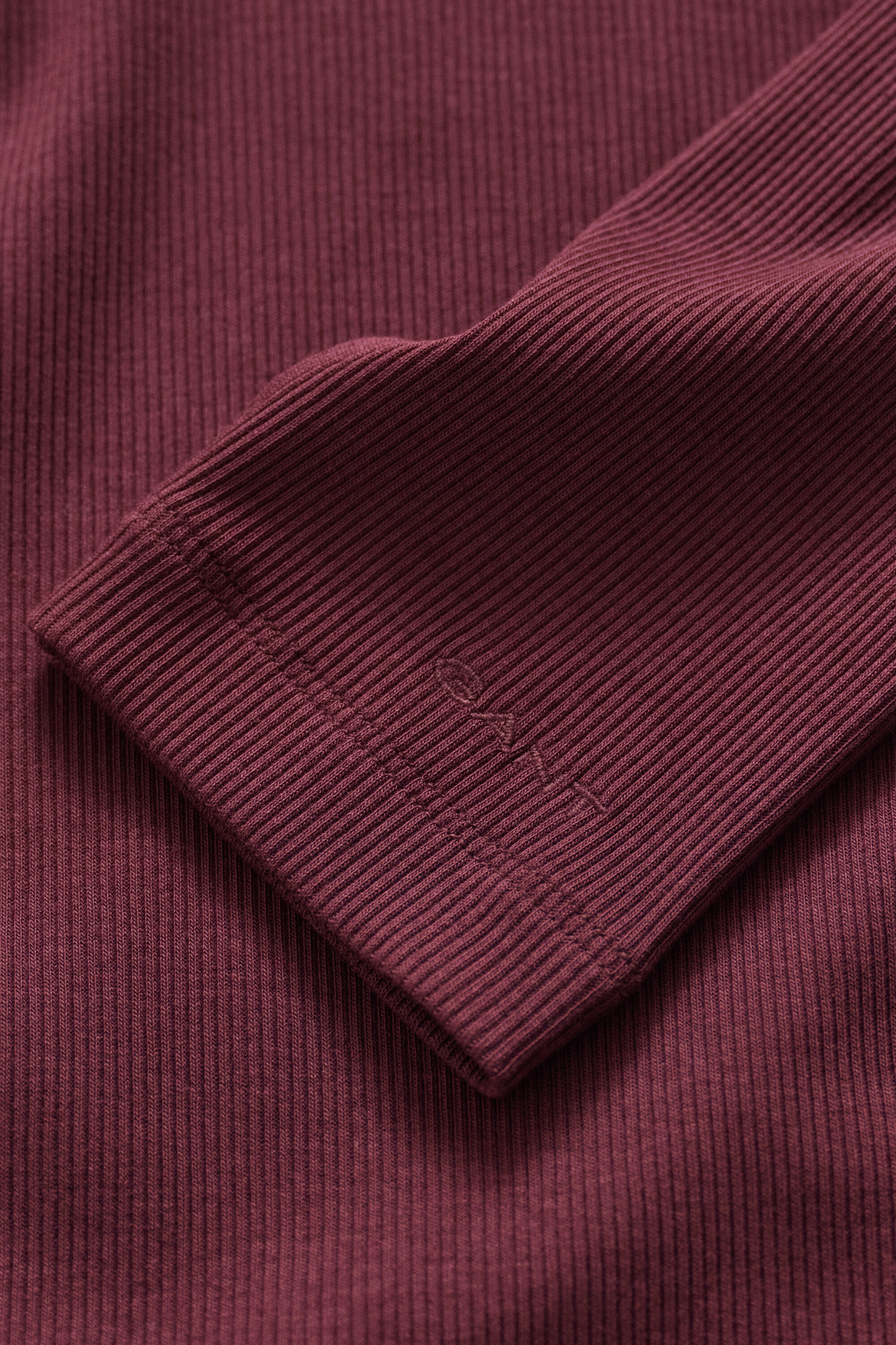 Maglia a collo alto a coste