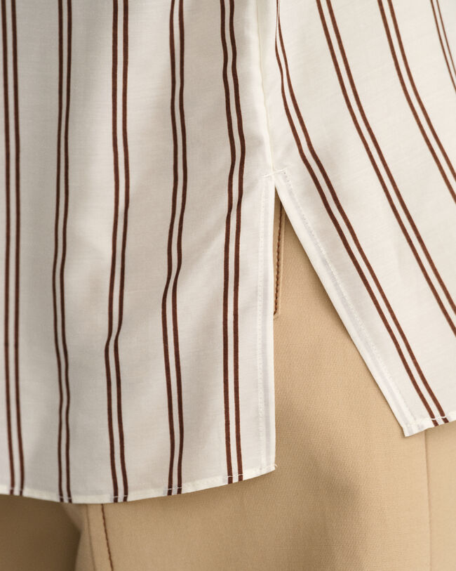 Blusa con scollo a V a righe