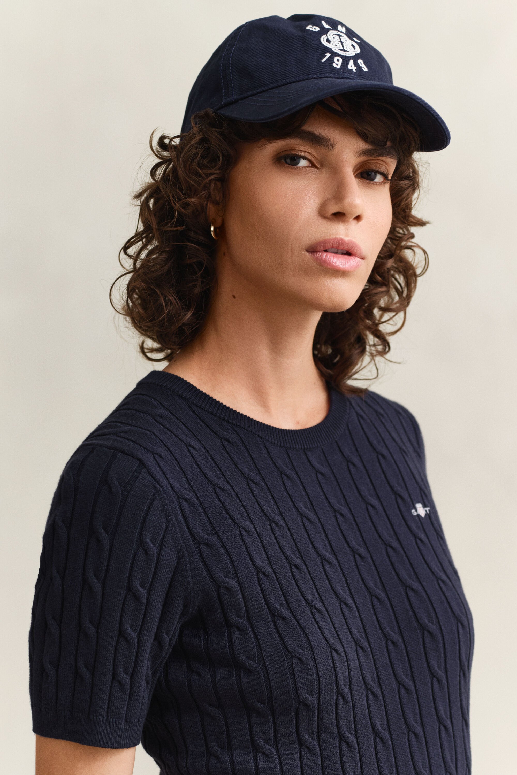 Maglia a trecce con maniche corte