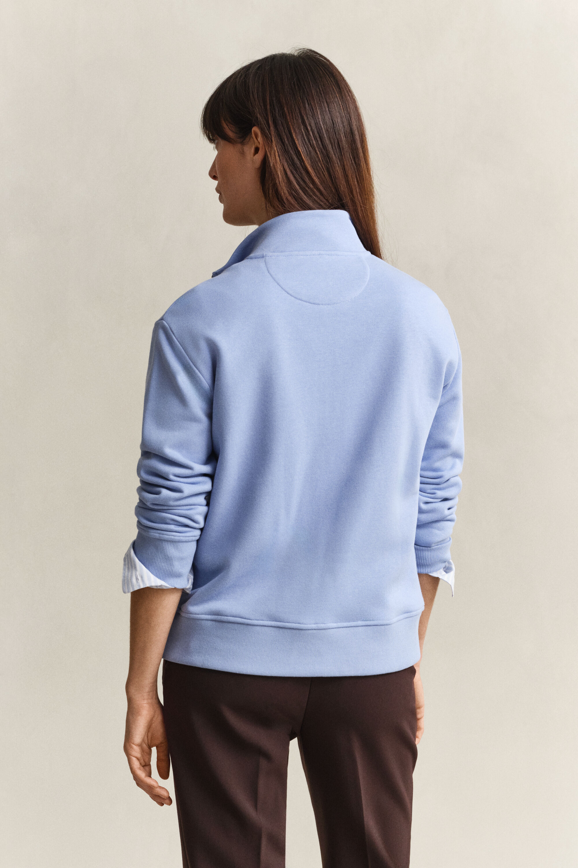 Felpa Shield con zip corta