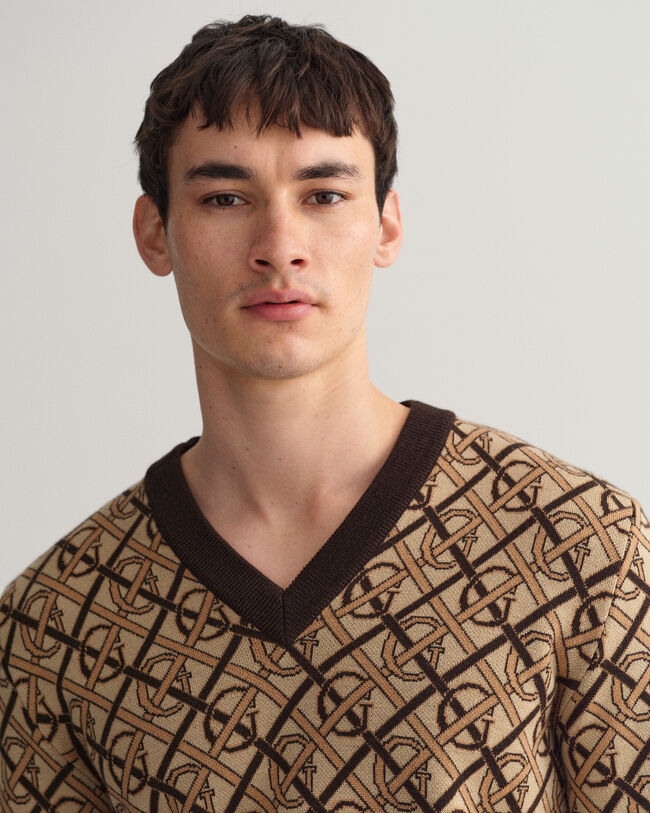 Maglia in lana merino con scollo a V Monogram