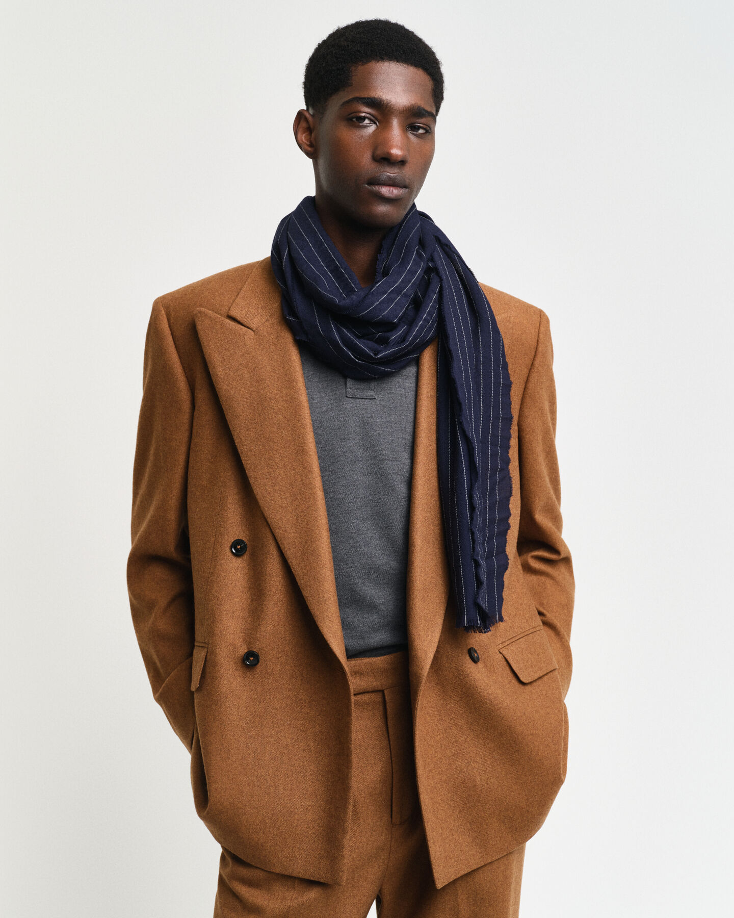 Sciarpa gessata in finissima lana merino