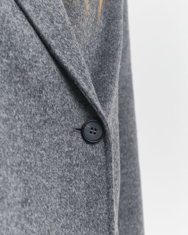 Giacca cucita a mano con cintura