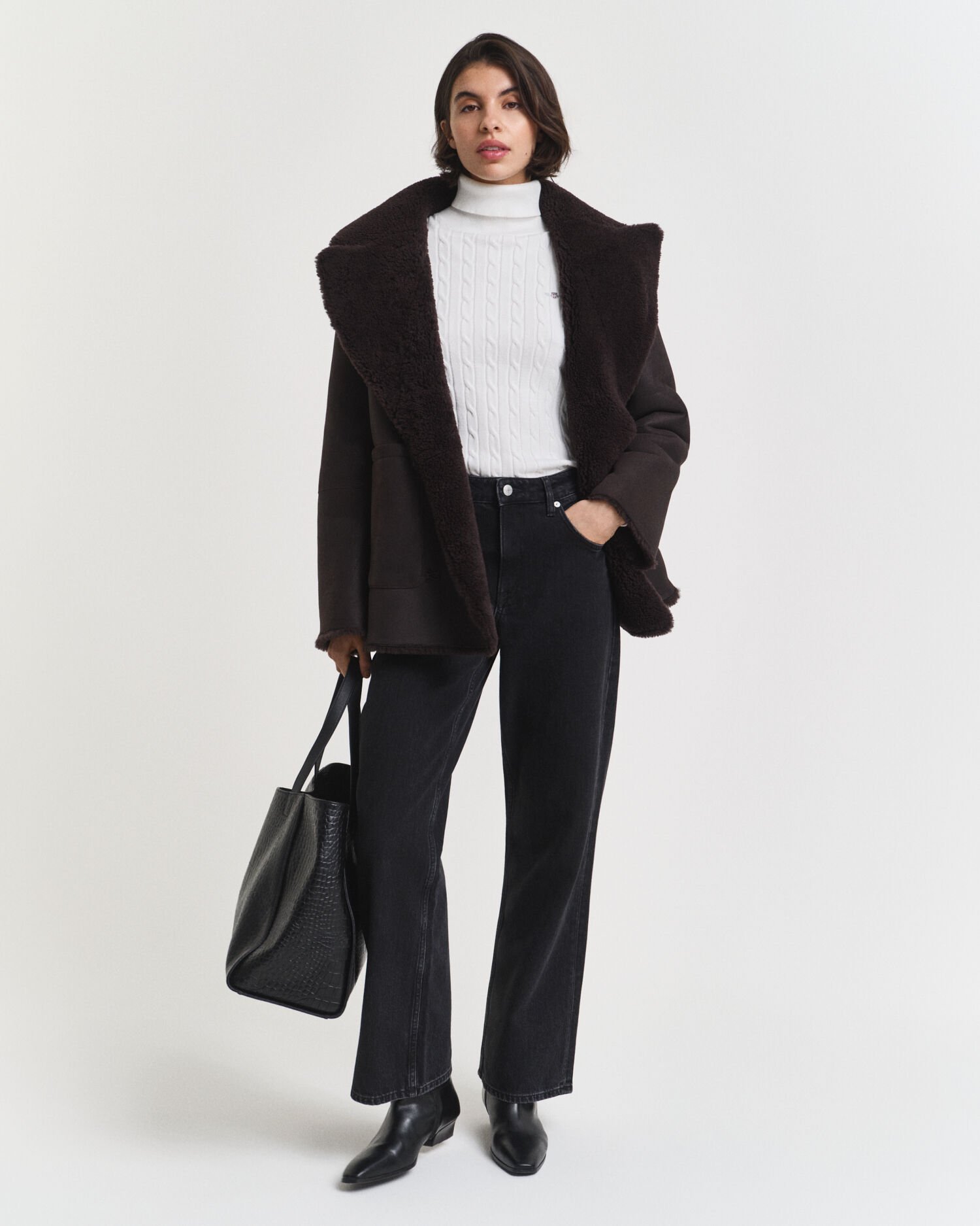 Maglia a collo alto in cotone elasticizzato a trecce