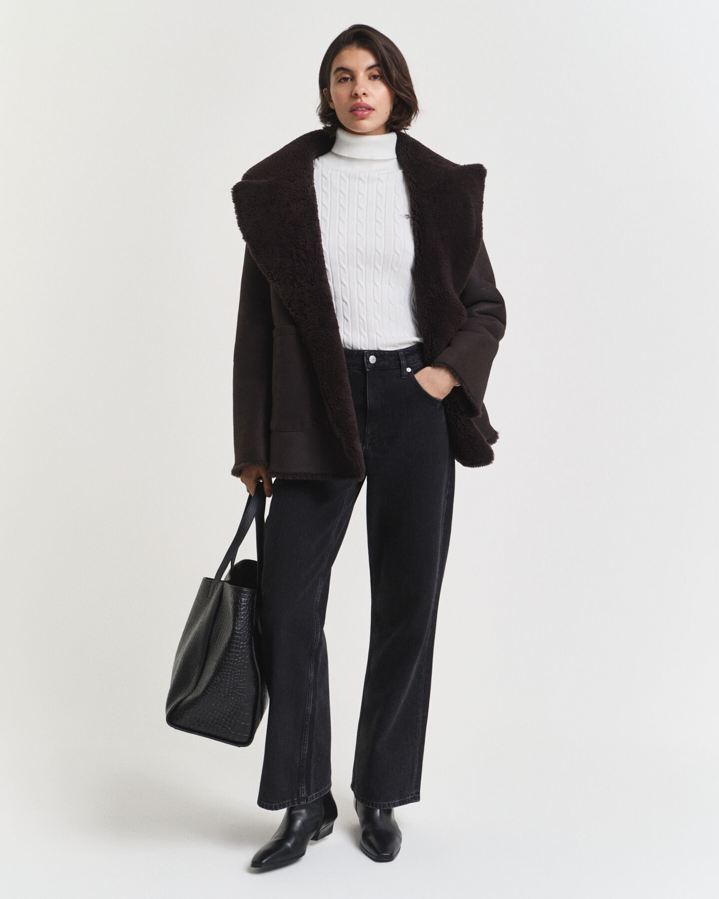 Maglia a collo alto in cotone elasticizzato a trecce