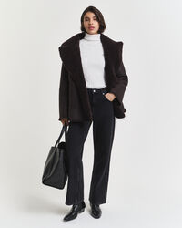 Maglia a collo alto in cotone elasticizzato a trecce