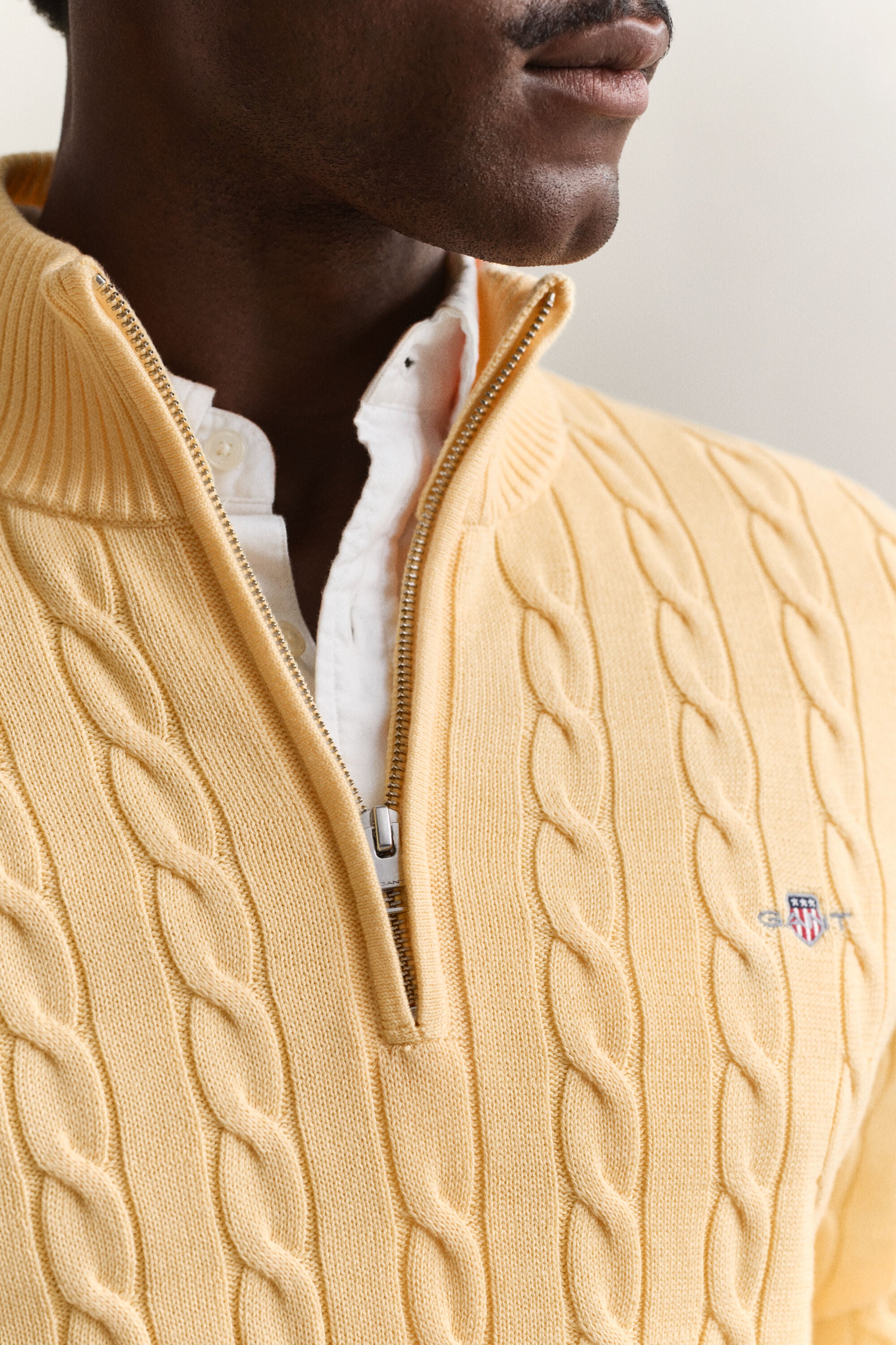Maglia con zip corta in cotone a trecce