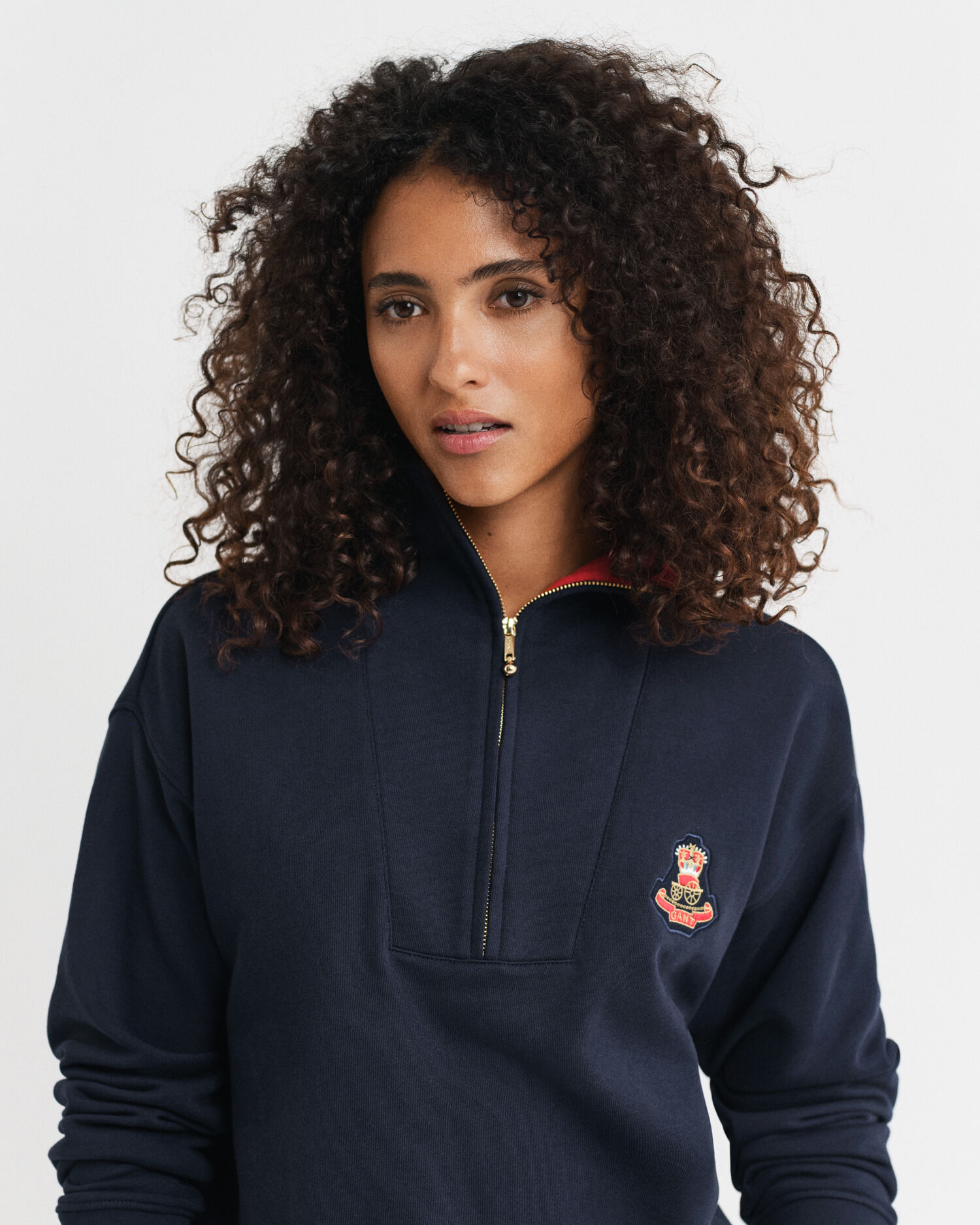 Felpa corta con zip e Crest Badge
