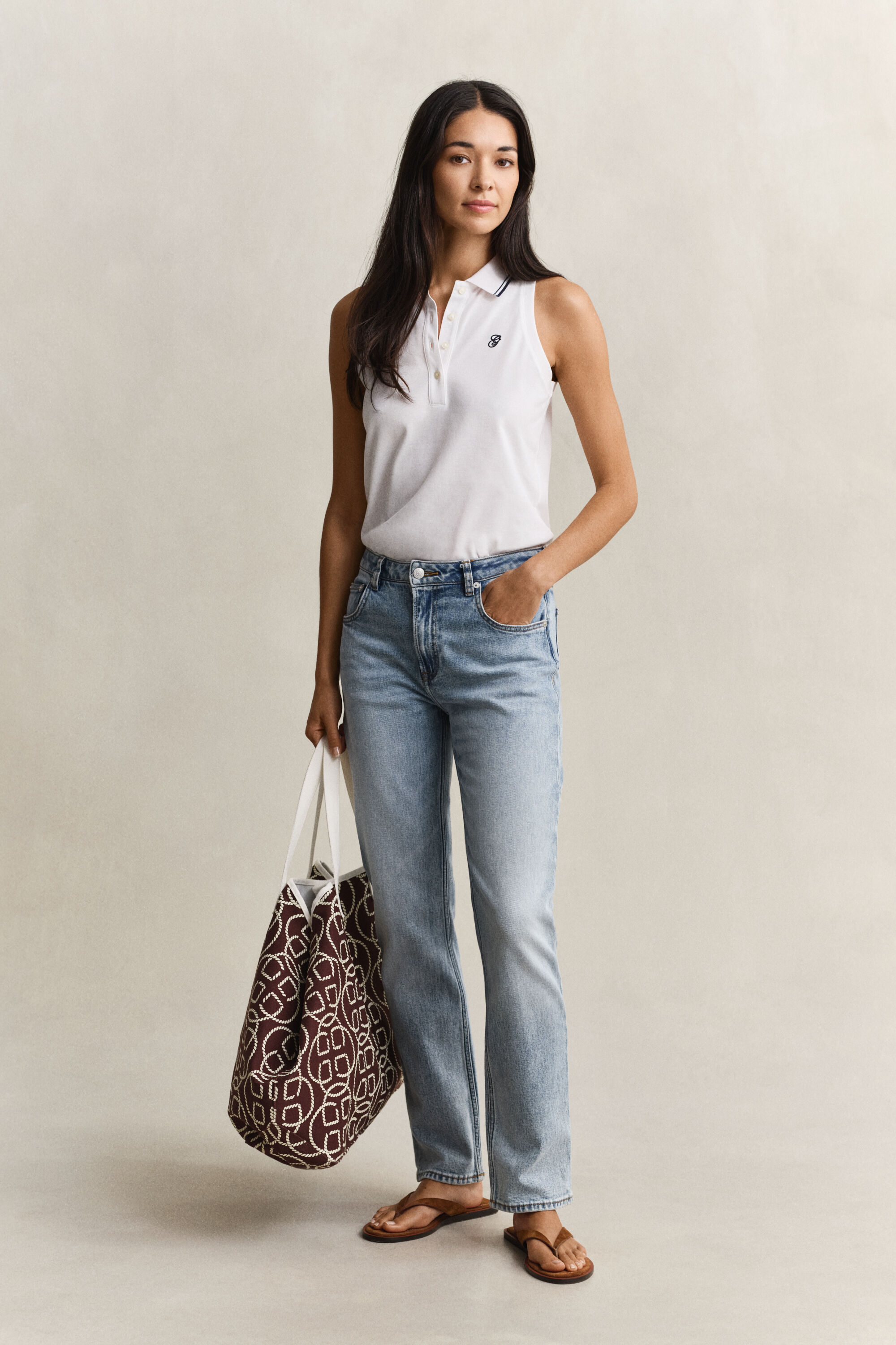 Polo smanicata in piqué