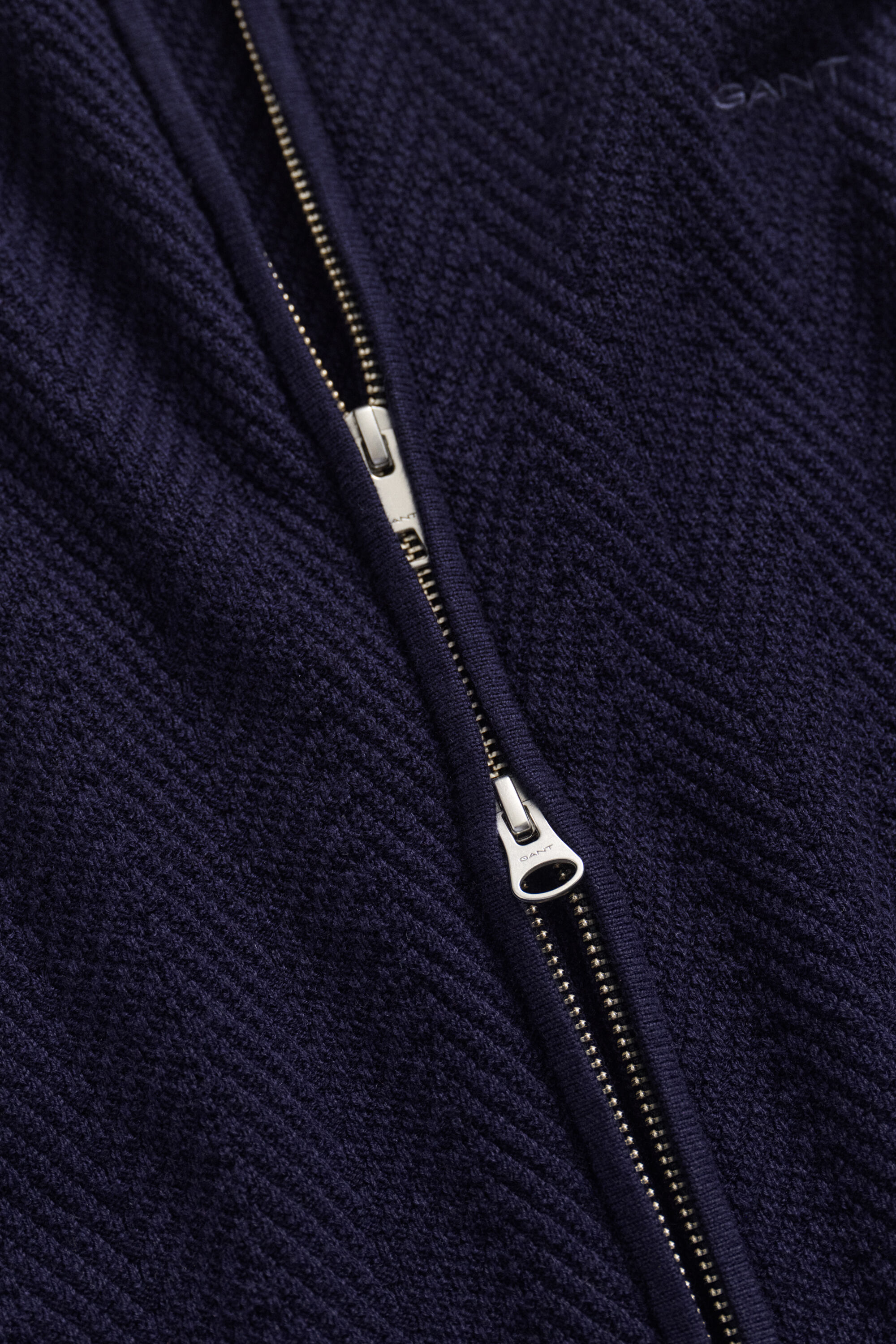 Cardigan con zip e motivo a spina di pesce