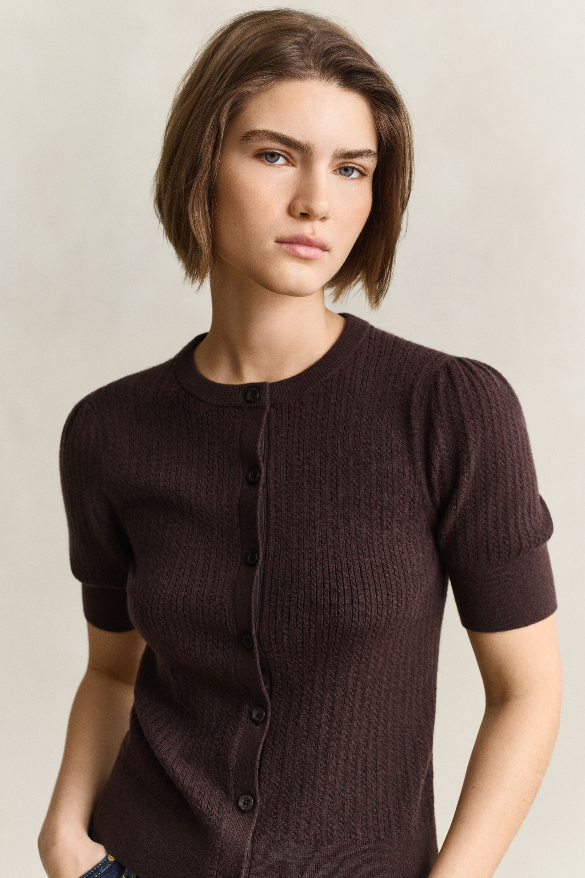 Cardigan a trecce con maniche corte