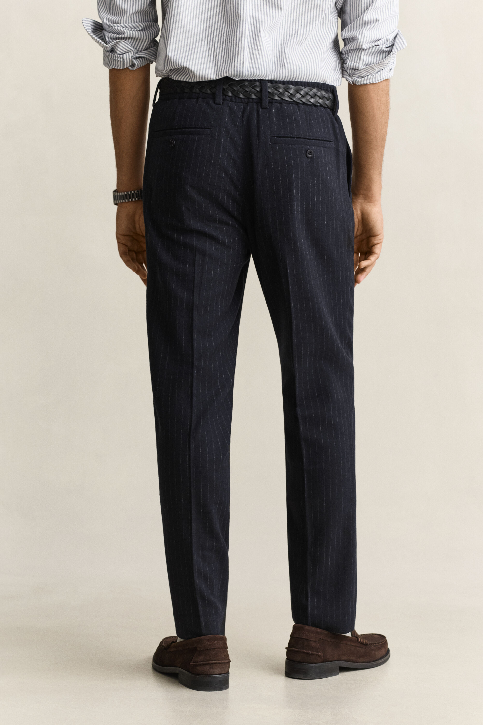 Pantaloni in flanella di lana stretti in fondo