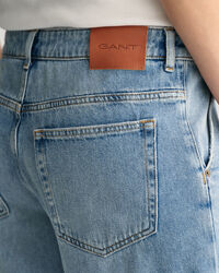 Jeans a gamba larga e vita bassa