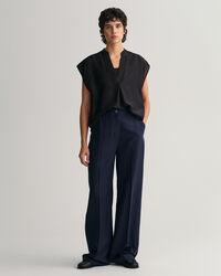 Blusa smanicata con colletto alla coreana