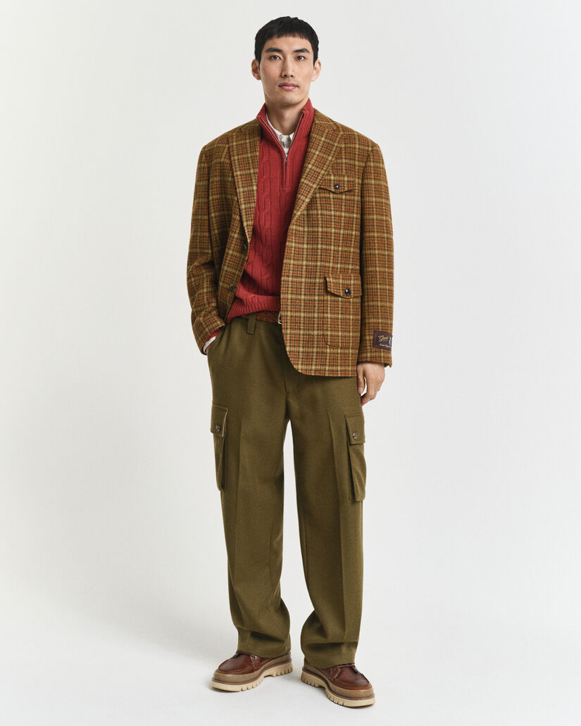 Maglia con zip corta in lana d’agnello a trecce