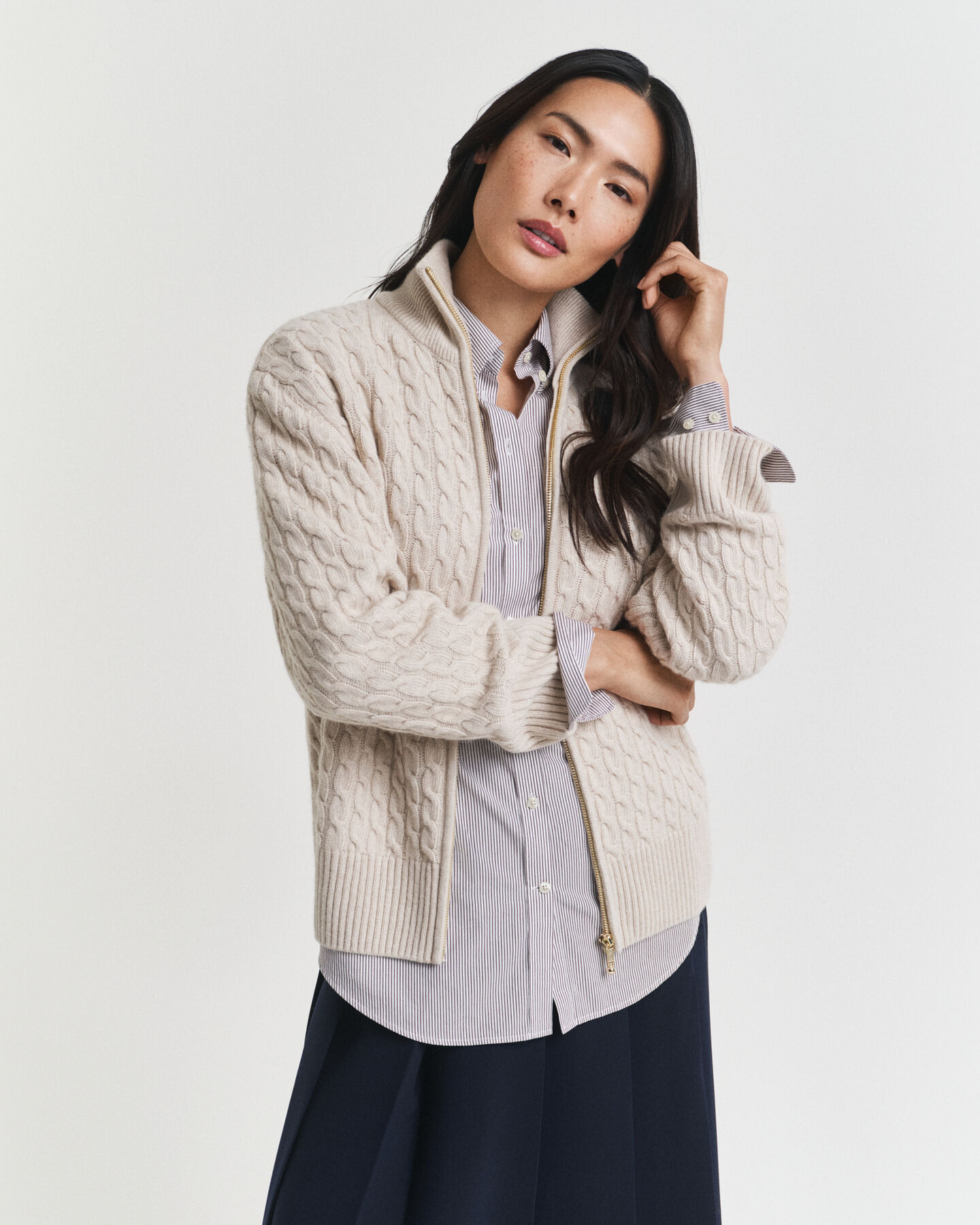 Cardigan con zip lavorato a trecce