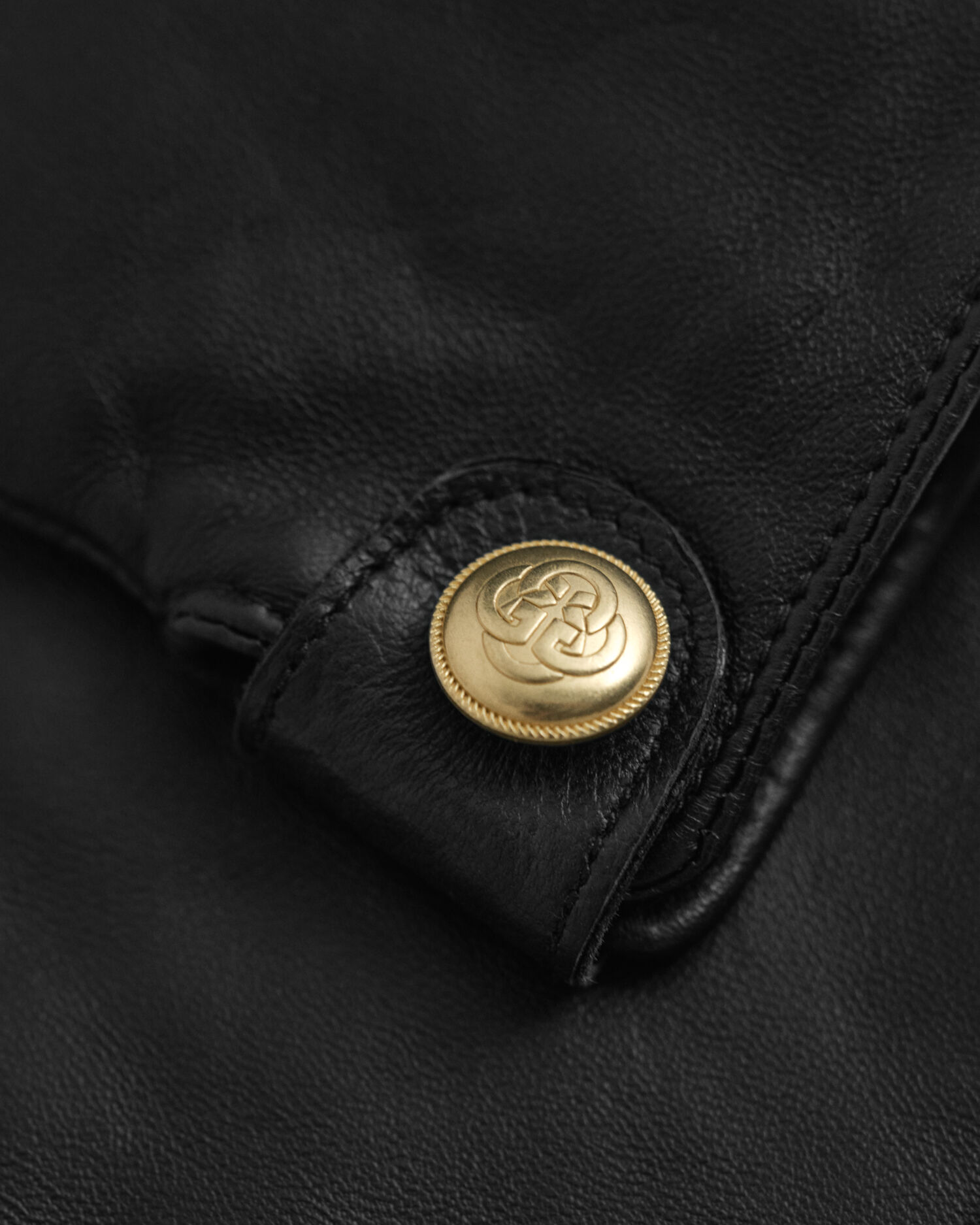 Guanti in pelle con bottoni