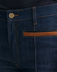 Jeans con dettagli in pelle slim fit