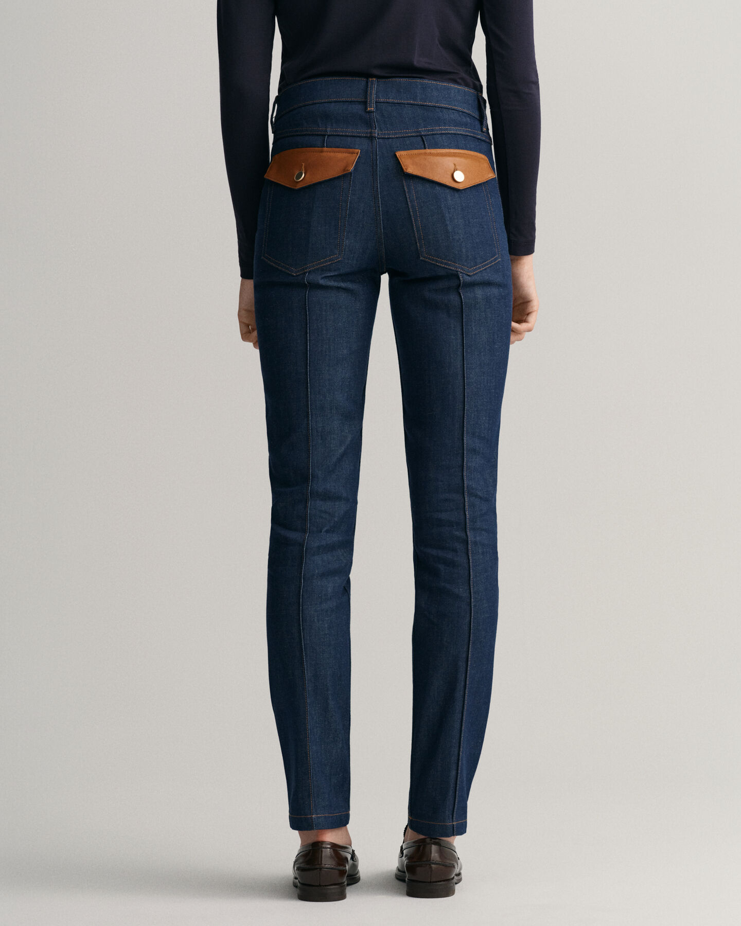 Jeans con dettagli in pelle slim fit