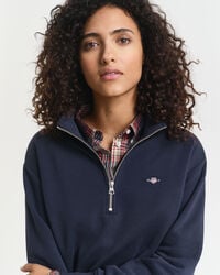 Felpa Shield con zip corta