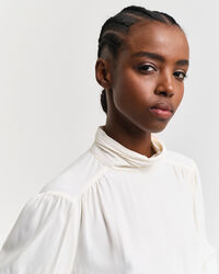 Blusa con finto collo alto