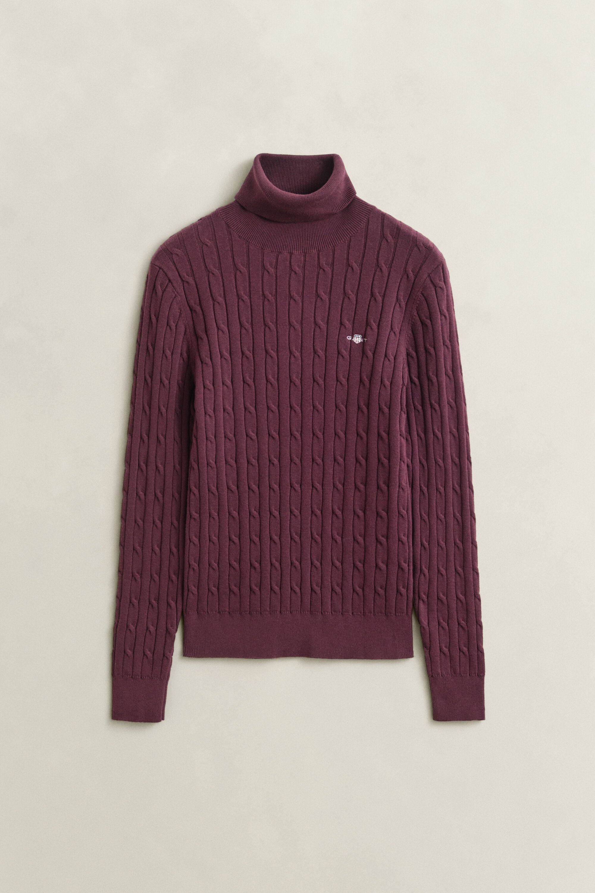 Maglia a collo alto in cotone elasticizzato a trecce