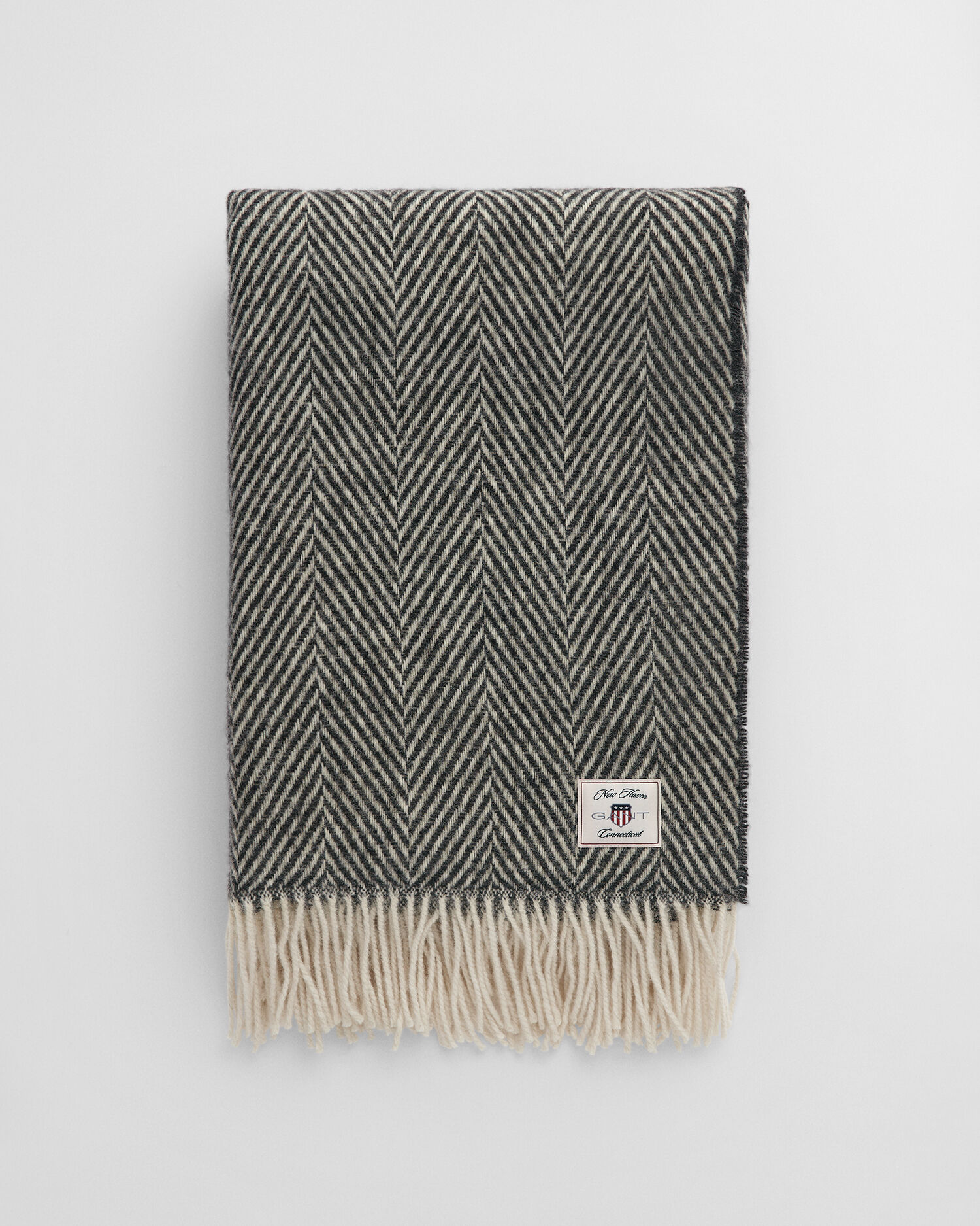 Coperta in lana con motivo a spina di pesce