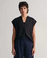 Blusa smanicata con colletto alla coreana