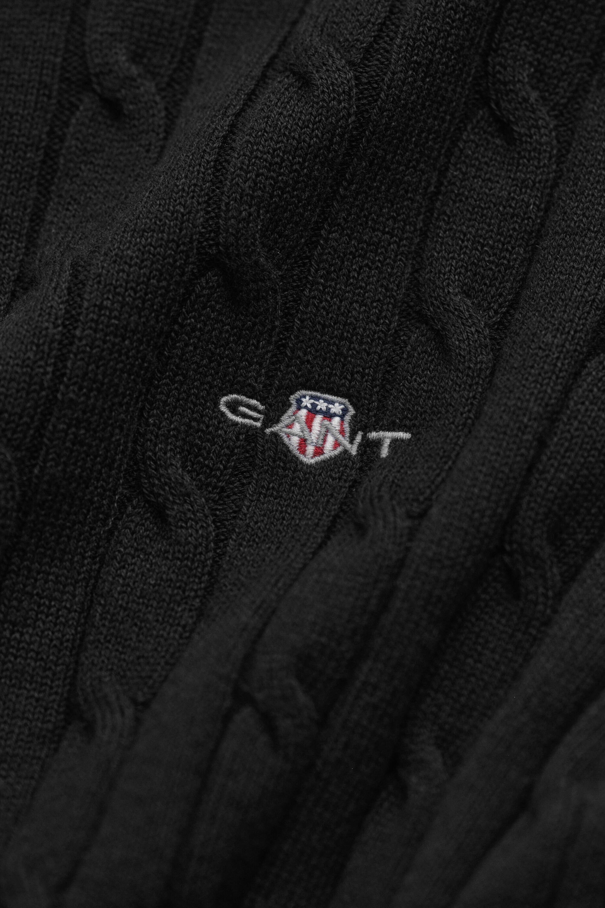Maglia girocollo in cotone elasticizzato a trecce
