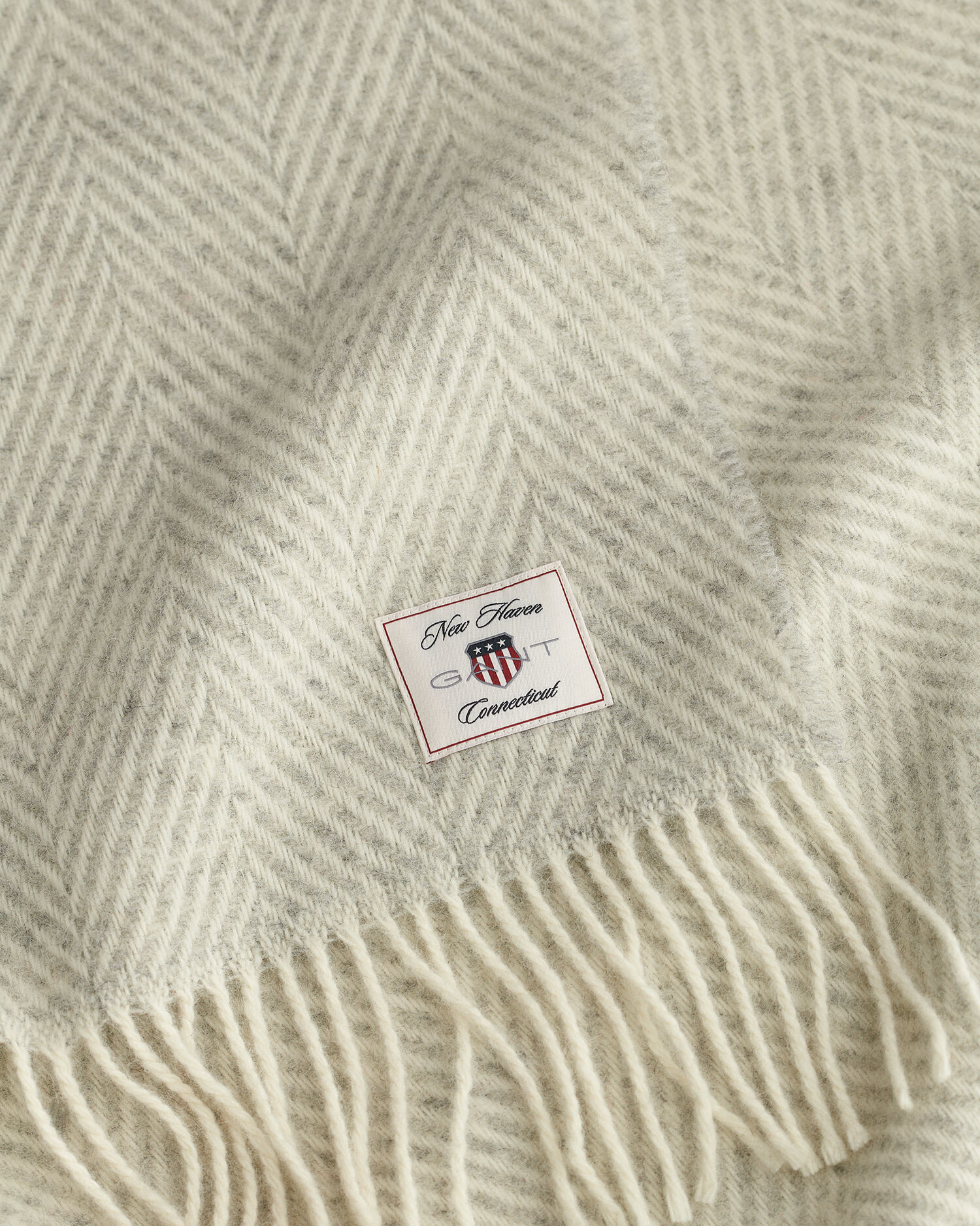 Coperta in lana con motivo a spina di pesce