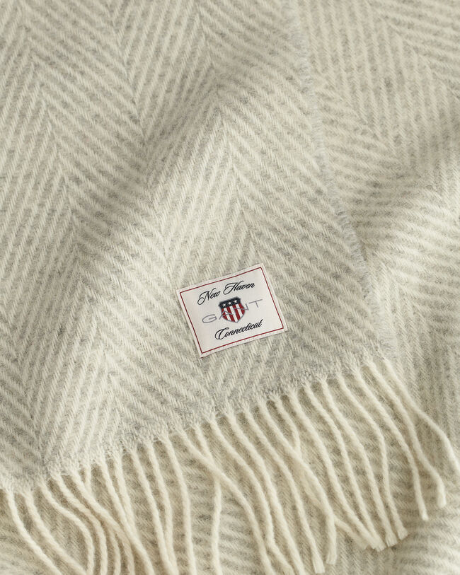 Coperta in lana con motivo a spina di pesce