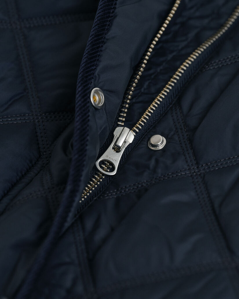 Cappotto trapuntato con finiture in velluto a coste