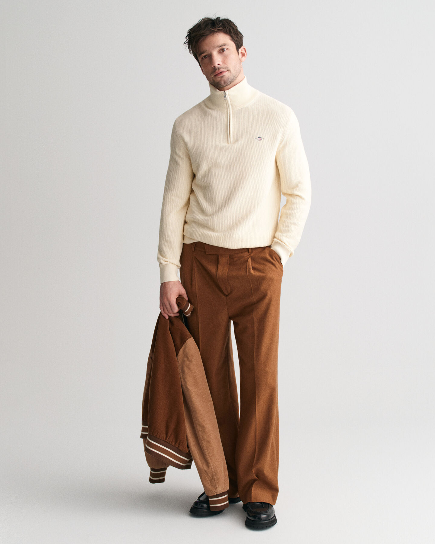 Maglia in cotone con micro rilievo e zip corta