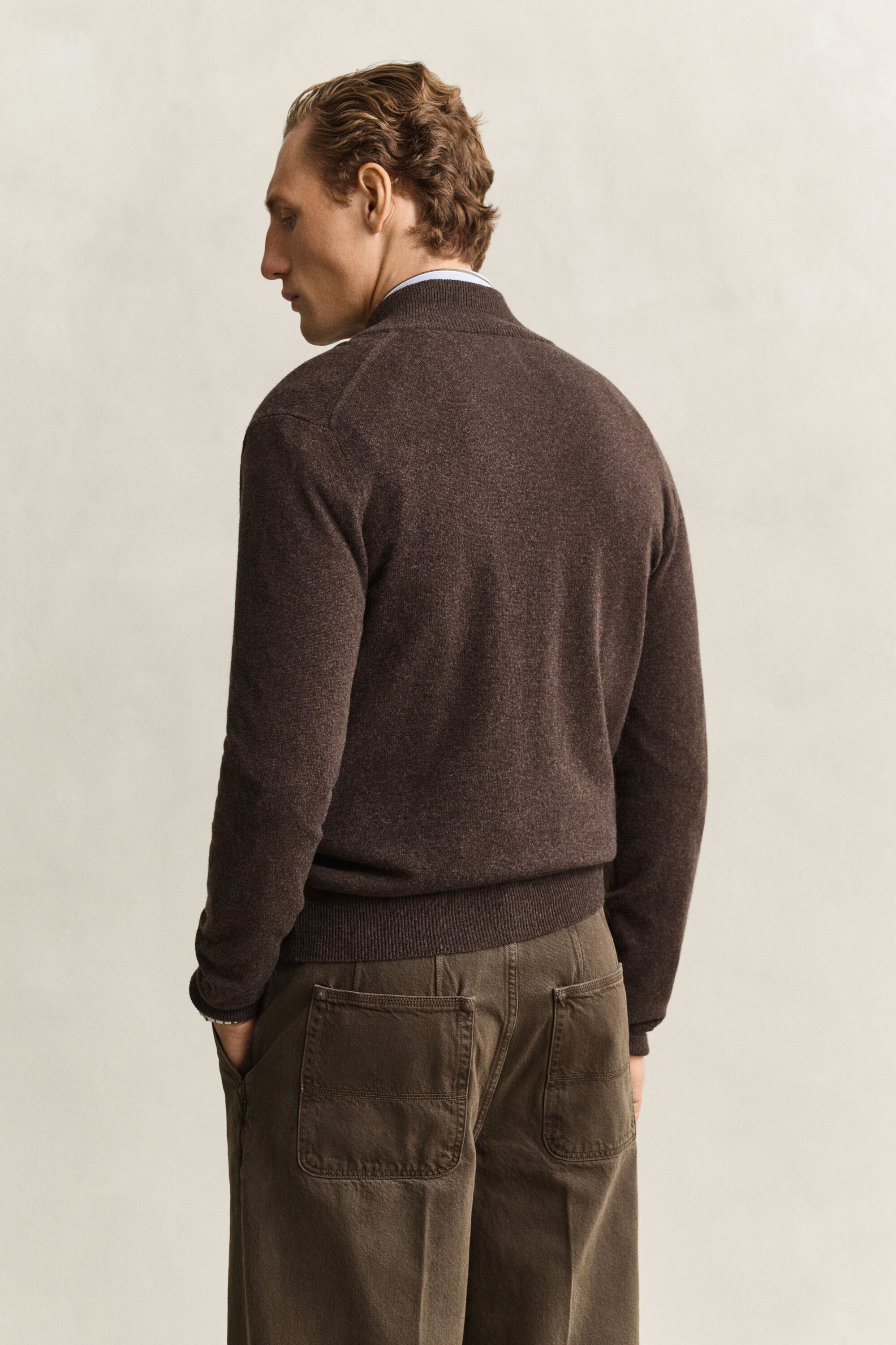 Cardigan con zip in lana d’agnello