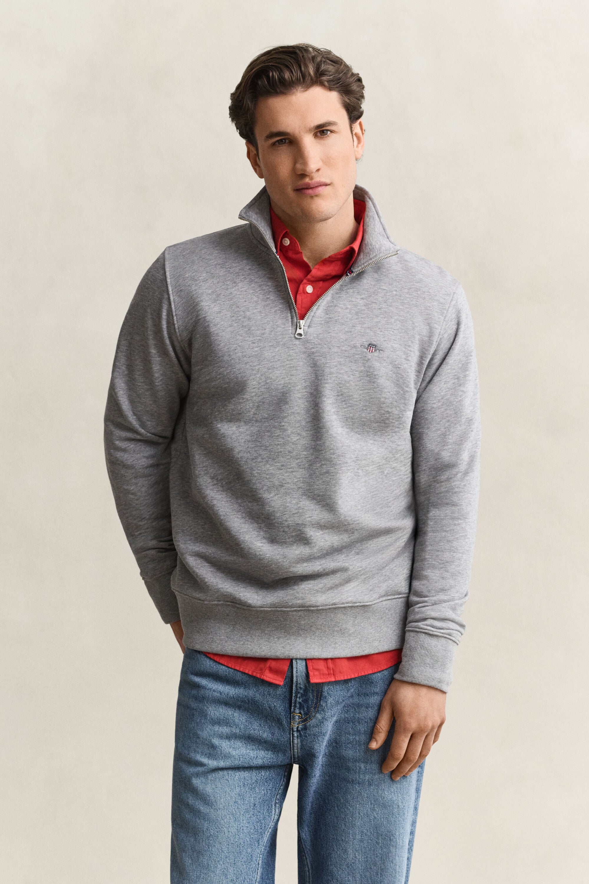 Felpa Shield con zip corta