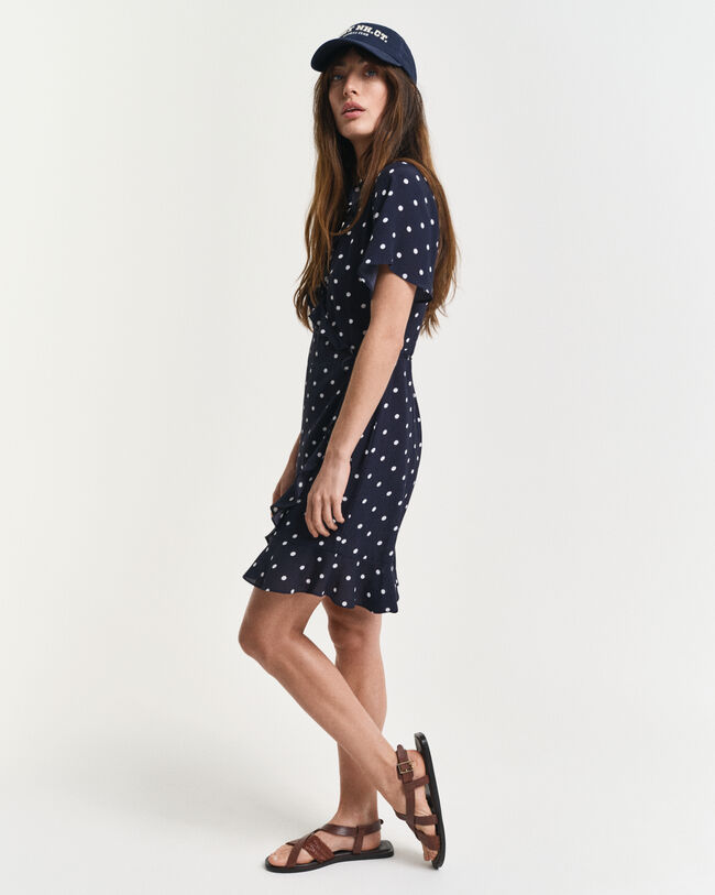 Abito con stampa a pois e volant