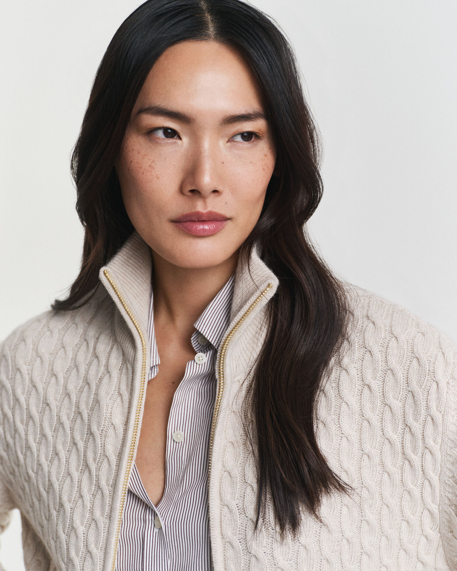 Cardigan con zip lavorato a trecce