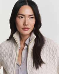 Cardigan con zip lavorato a trecce