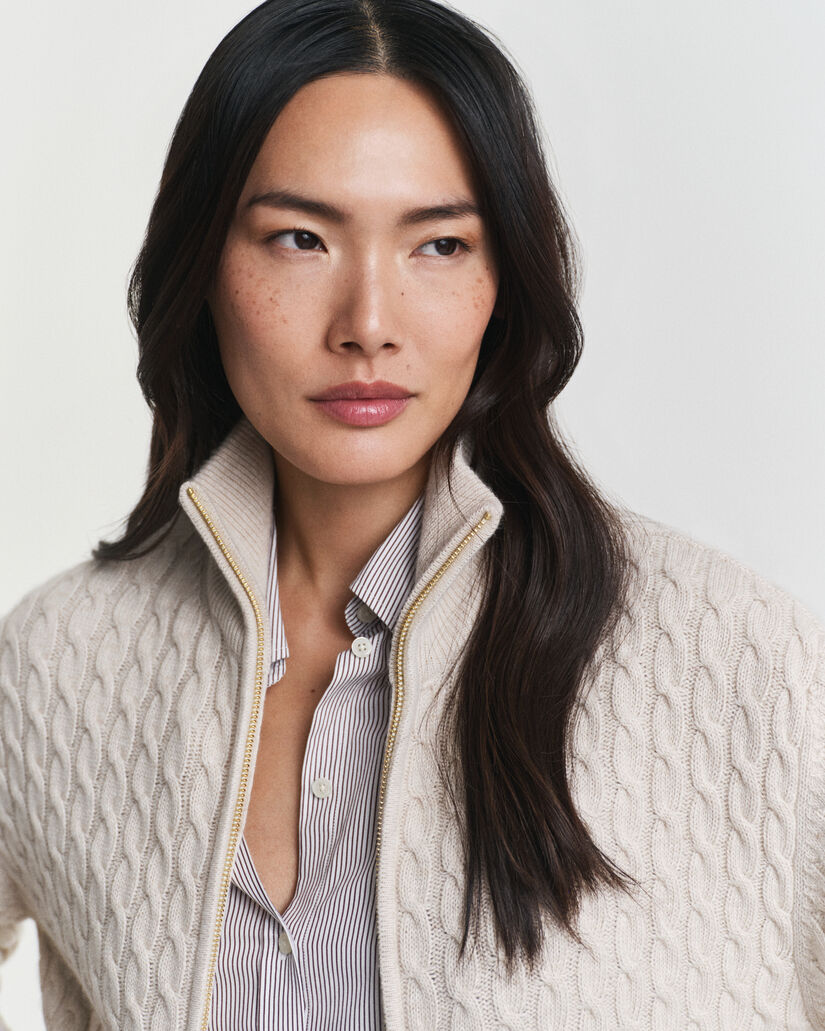 Cardigan con zip lavorato a trecce