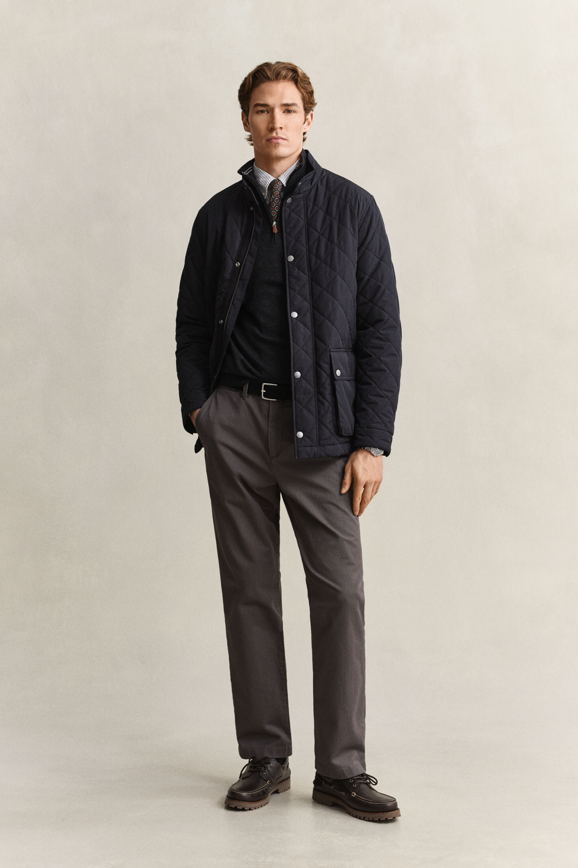 Maglia in lana merino a coste con zip corta