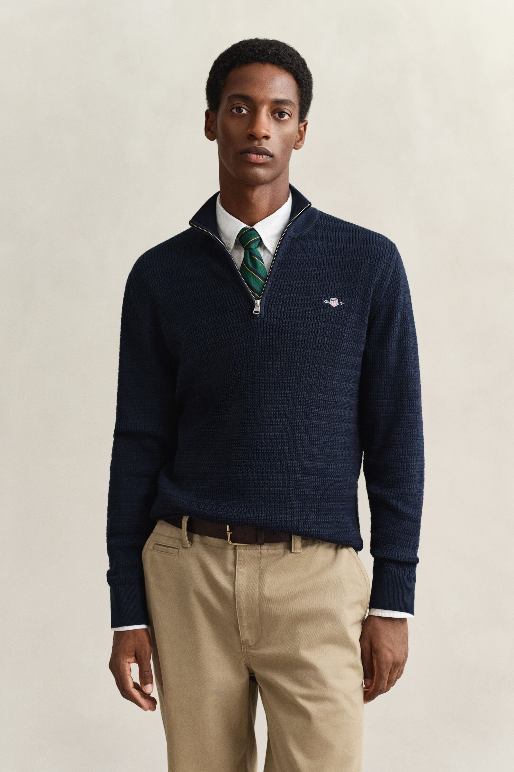 Maglia con zip corta a mini trecce