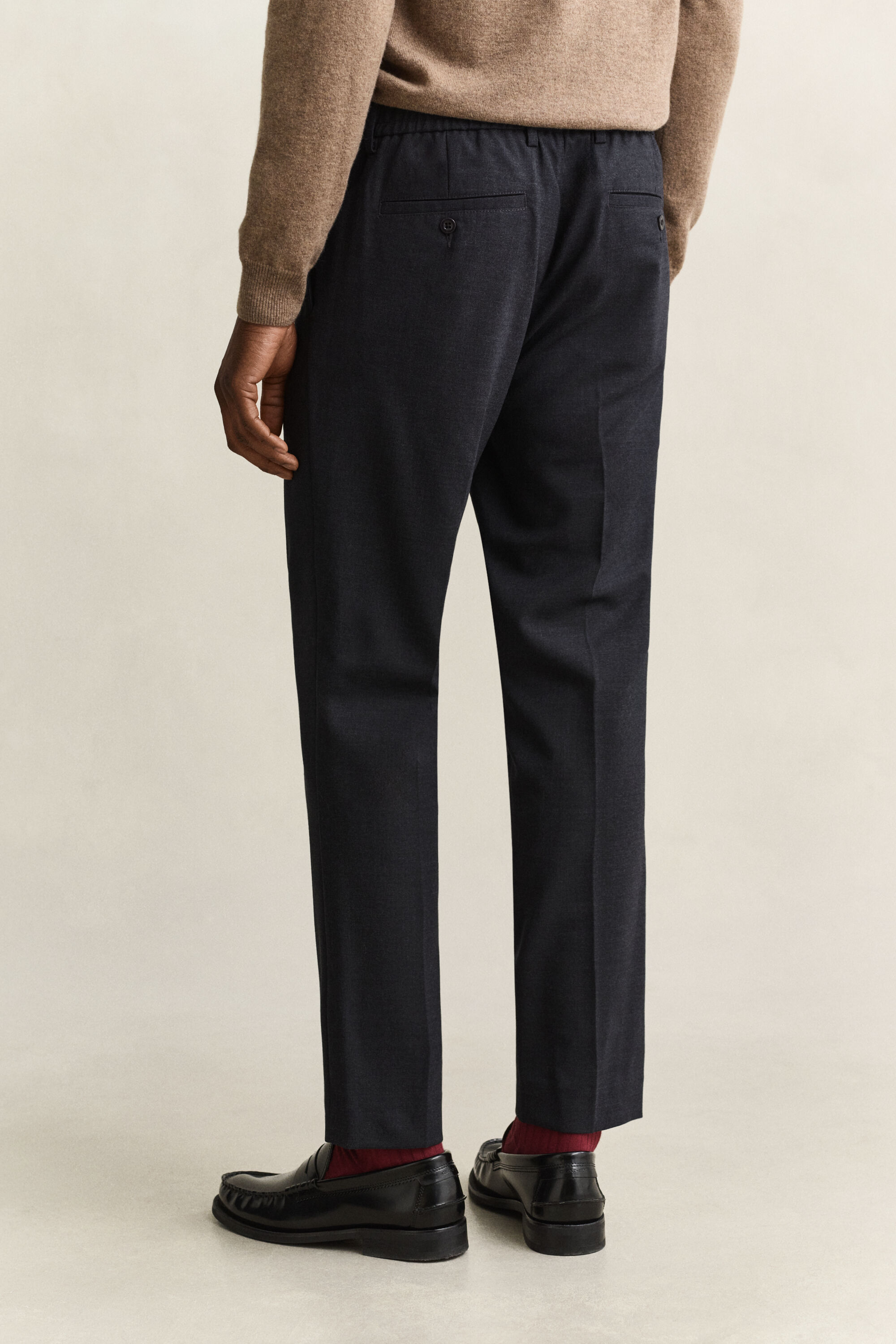 Pantaloni in lana stretti in fondo