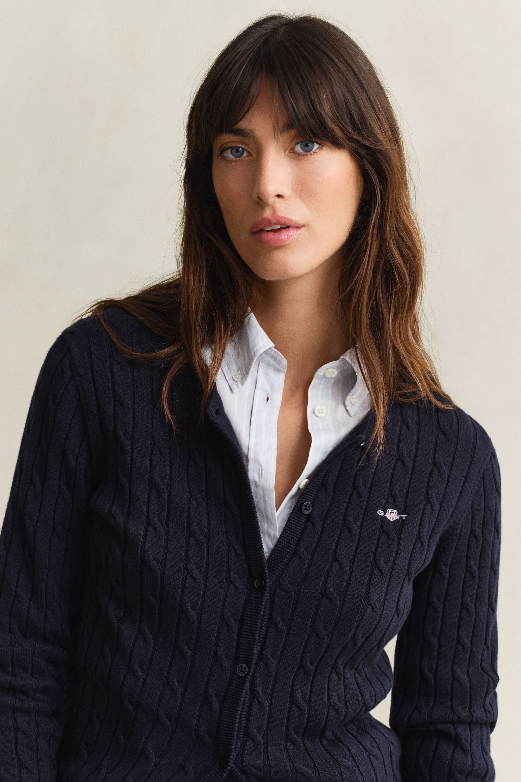 Cardigan in maglia con lavorazione a trecce