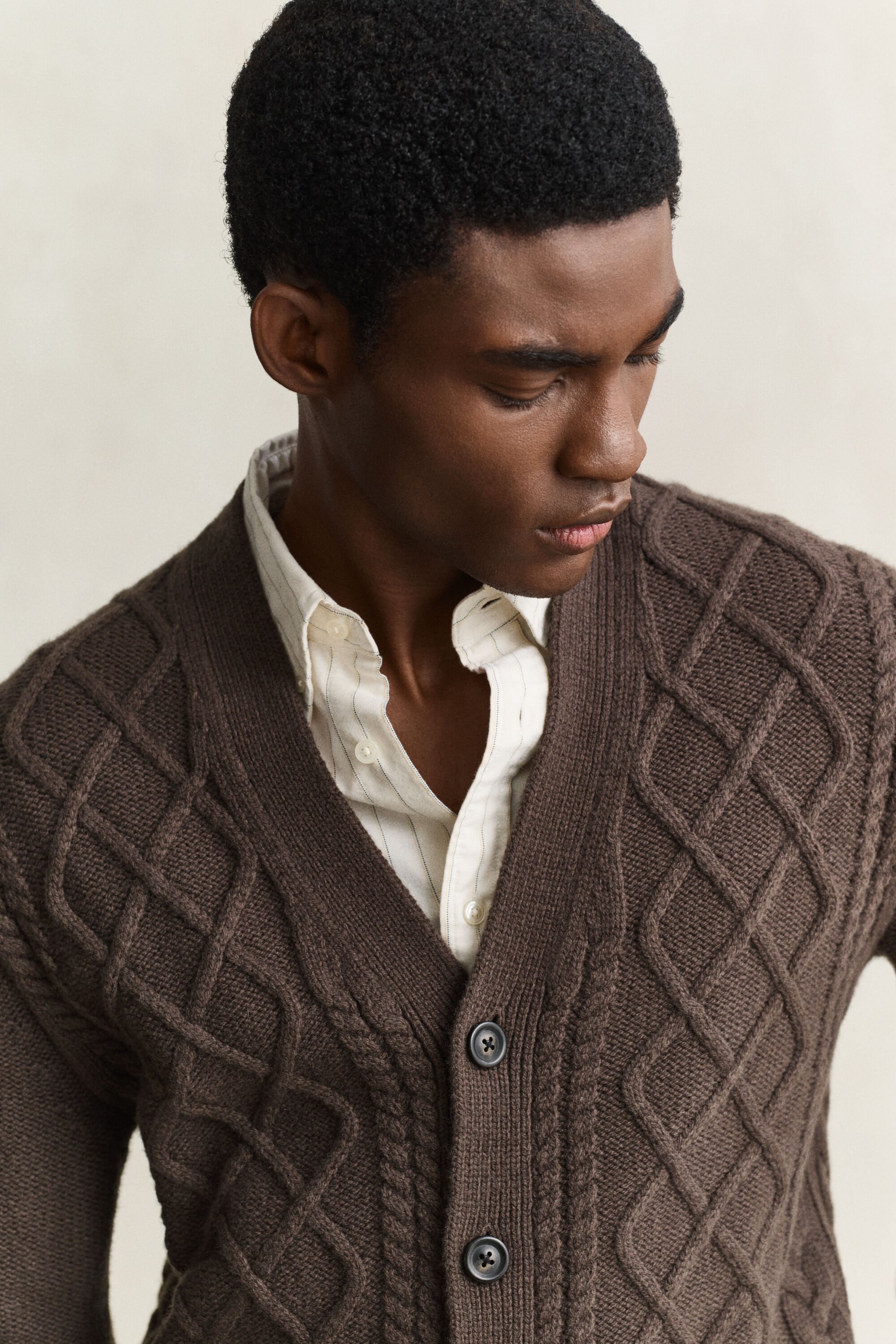 Cardigan in misto lana con lavorazione a trecce